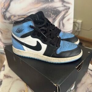 Nike Air Jordan 1 High OG in Black, White, and Blue